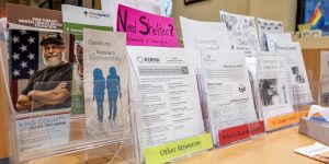 Brochure stand with informational materials for visitors of a recovery support organization