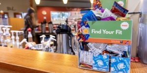 Cafe counter in a recovery support organization with a bin of free condoms