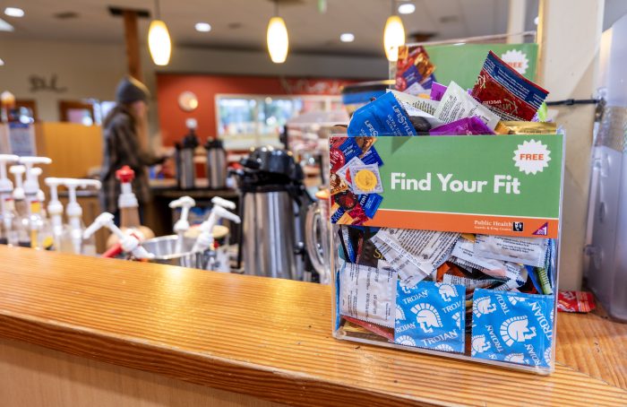 Cafe counter in a recovery support organization with a bin of free condoms