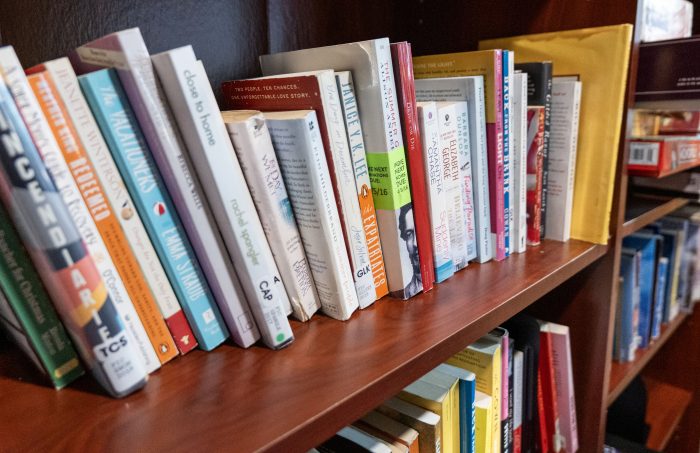 Row of books on a shelf in a recovery support organization