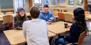 Group of people at a table in a recovery support organization