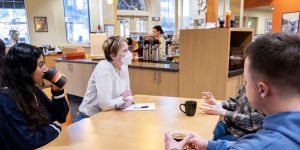 Group of people at a table in a recovery support organization