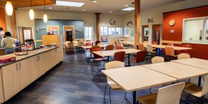 Warm, inviting community area of a recovery support organization and cafe